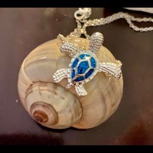 Silver turtle necklace with lab simulated opal